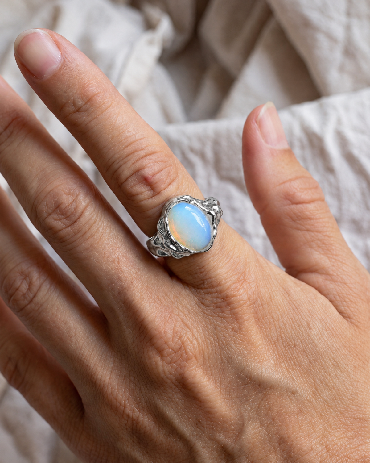 Drift Oval Ring in 925 sterling silver worn on the hand, shown true to size