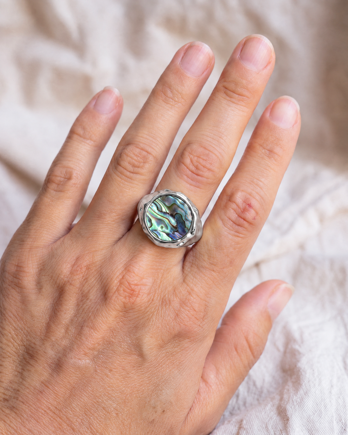 Abalone Dome Ring in 925 sterling silver worn on the hand, shown true to size
