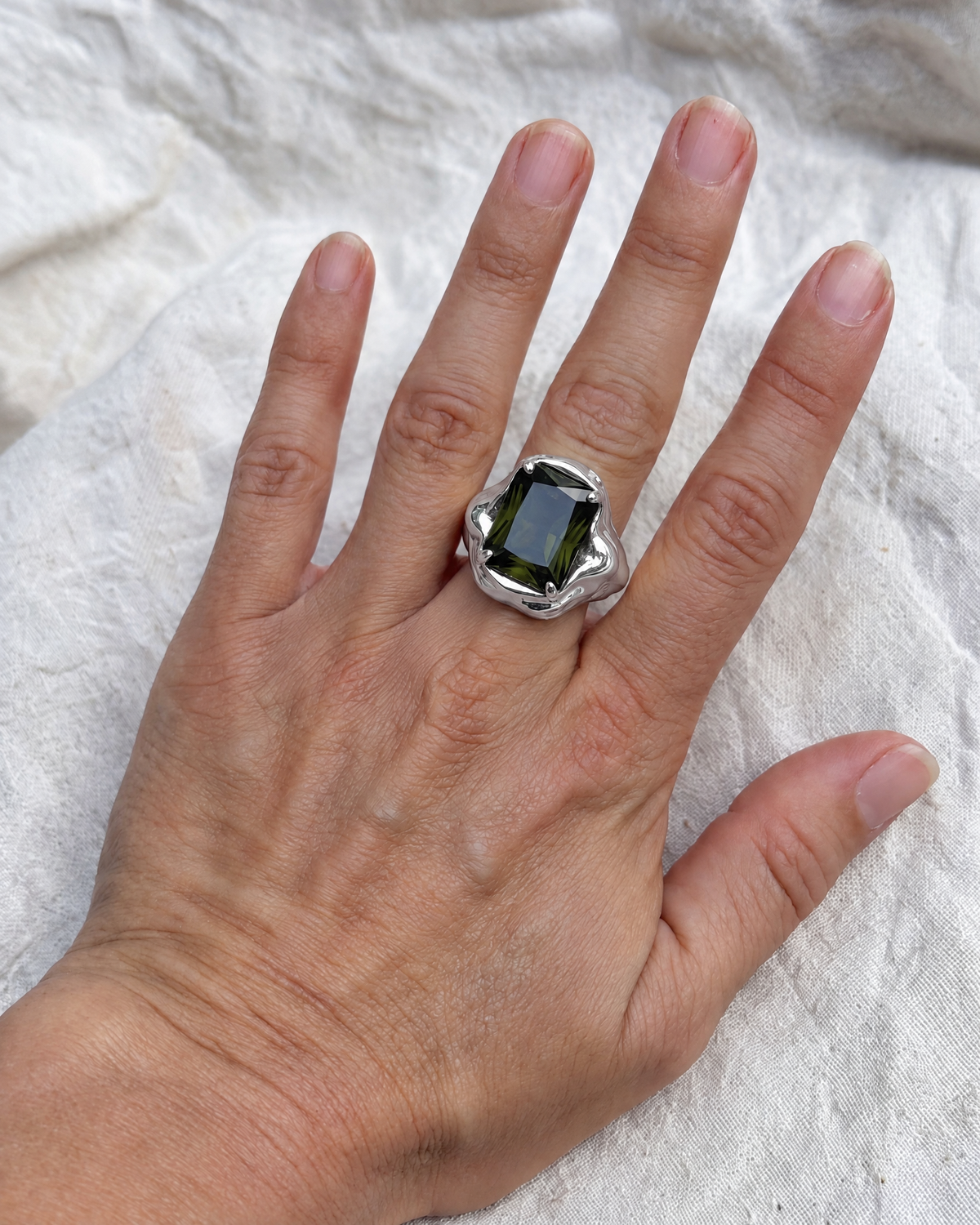 Melt Signet Ring in 925 sterling silver worn on the hand, shown true to size