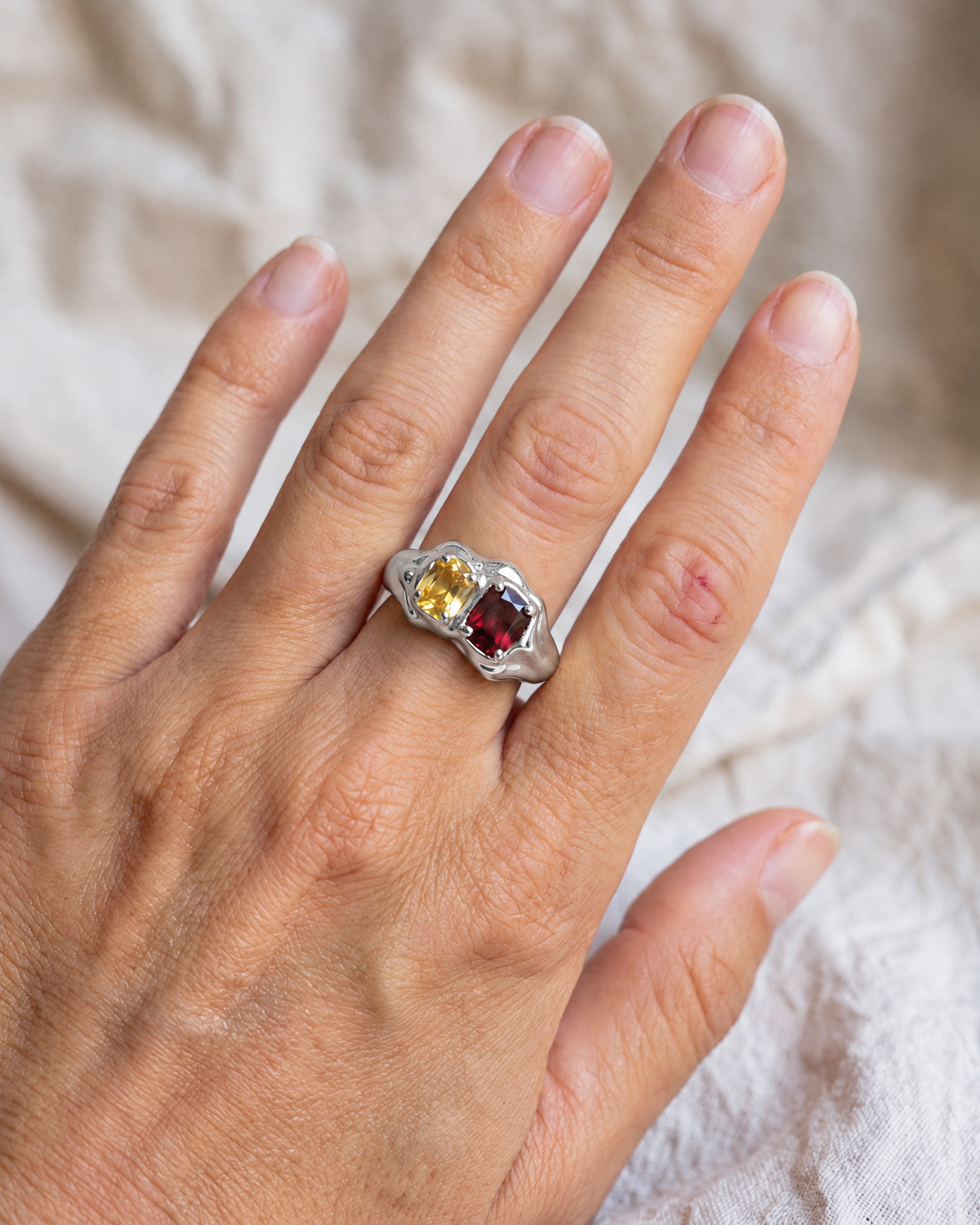 Double Stone Ring in 925 sterling silver worn on the hand, shown true to size