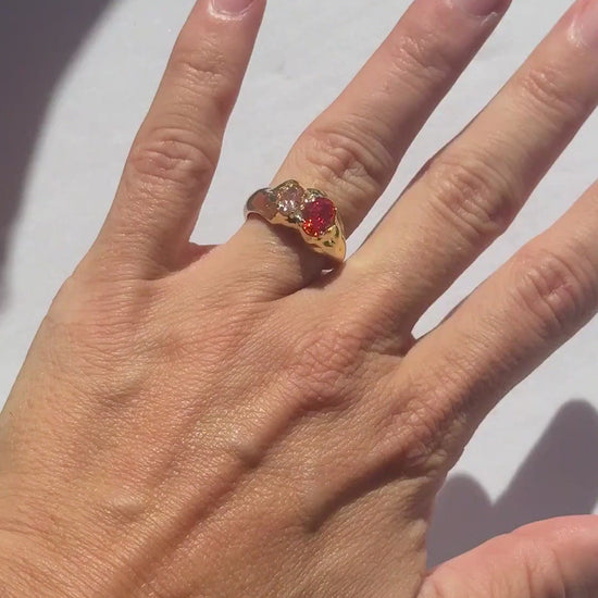 Ember Double Stone Ring in orange and peach worn on the hand in sunlight