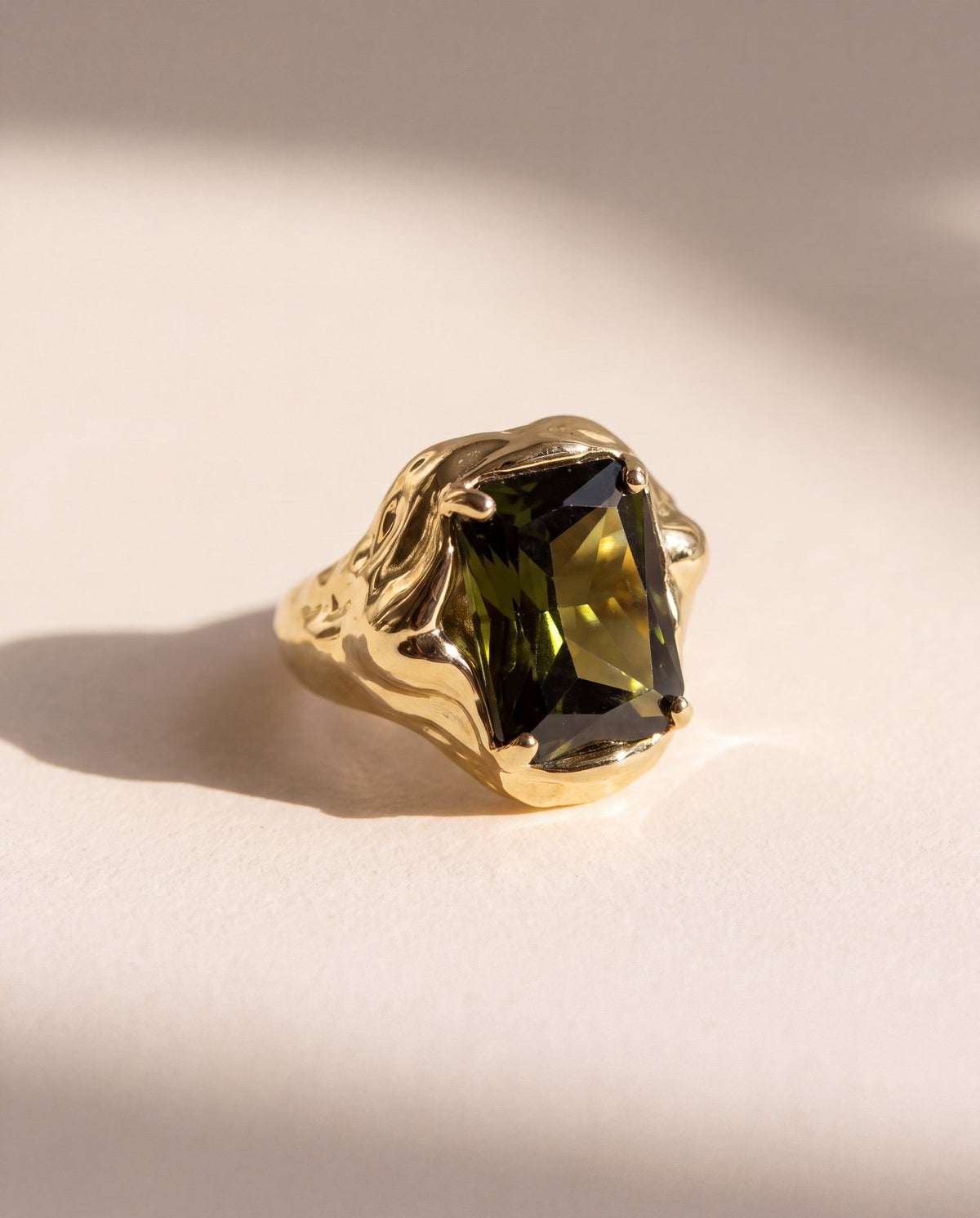 Melt Signet Ring in 18K gold vermeil with an emerald cut green tourmaline