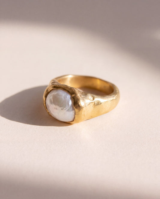 Raw Pearl Molten Ring in matte 18K gold vermeil, a baroque pearl held in a raw hand formed bezel