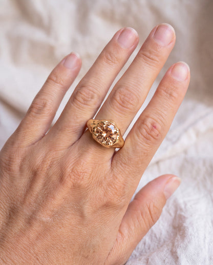 Solar Disc Ring worn on the hand, shown true to size